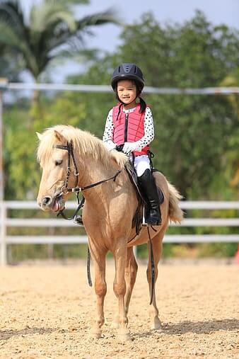 under 6 rider on pony